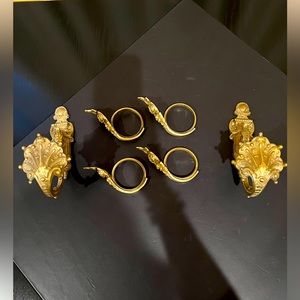 Set of bronze drapery accessories.